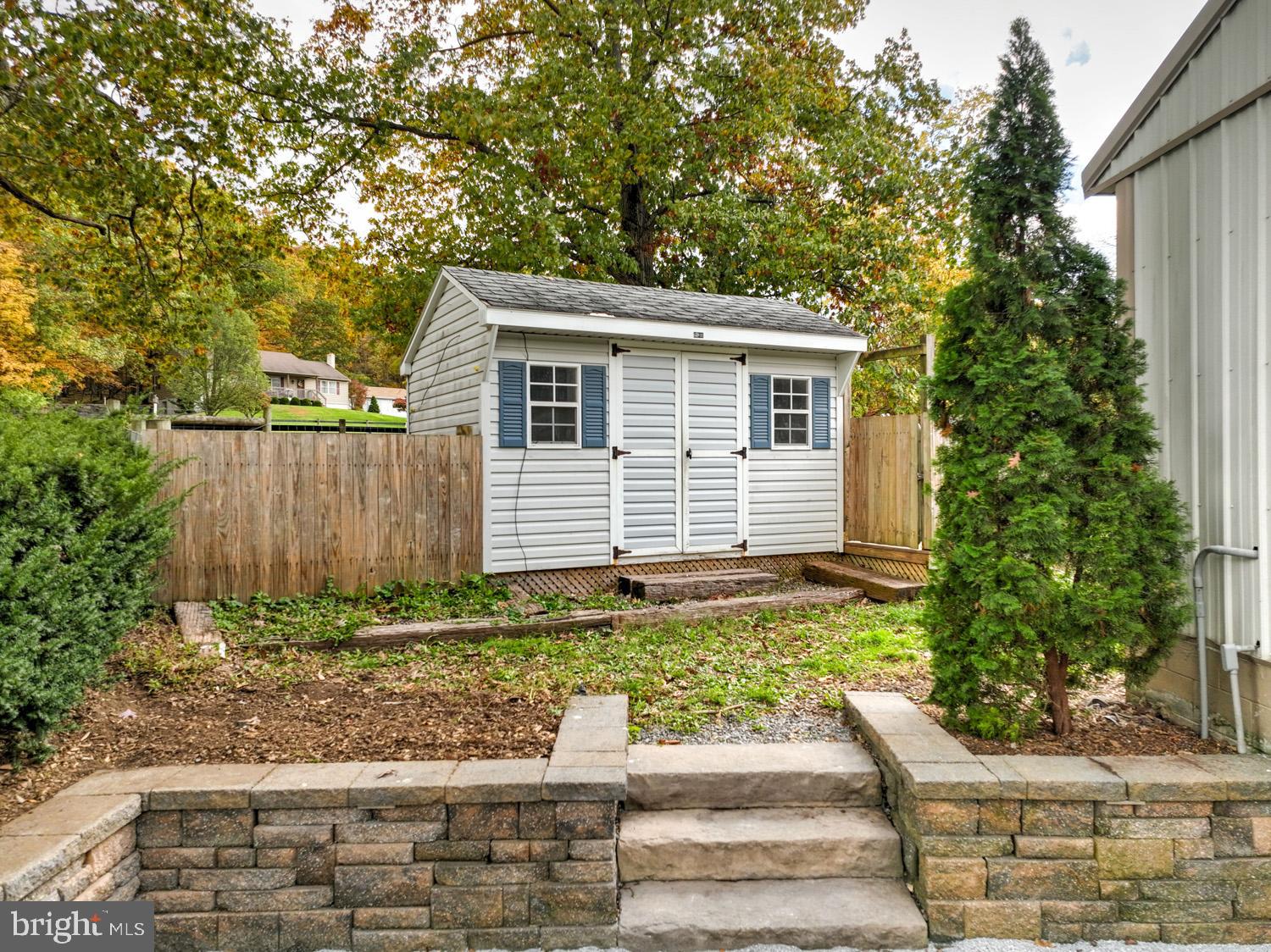1682 Reading Road Mohnton, PA 19540 - Photo 25 of 73 a front view of a house with garden