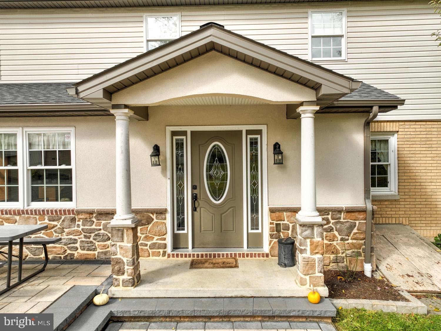 1682 Reading Road Mohnton, PA 19540 - Photo 32 of 73 a front view of a house with outdoor seating