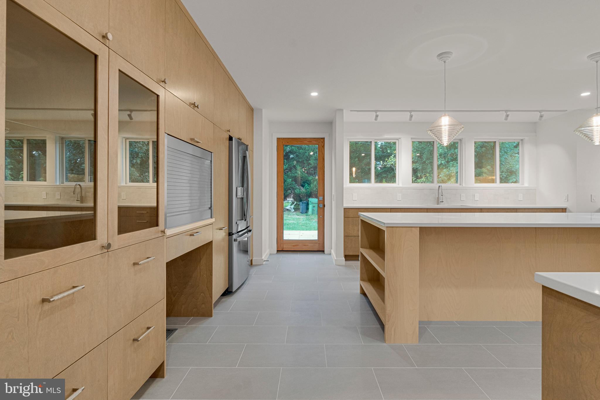 2706 Bartol Avenue Baltimore, MD 21209 - Photo 13 of 62 a view of a kitchen with a sink and dishwasher stove top oven
