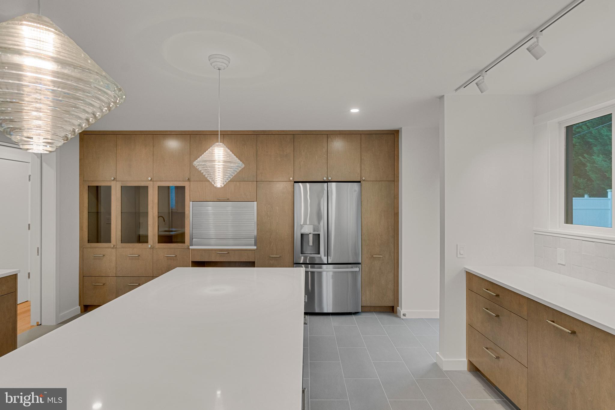 2706 Bartol Avenue Baltimore, MD 21209 - Photo 18 of 62 a view of a kitchen with a refrigerator a sink and dishwasher