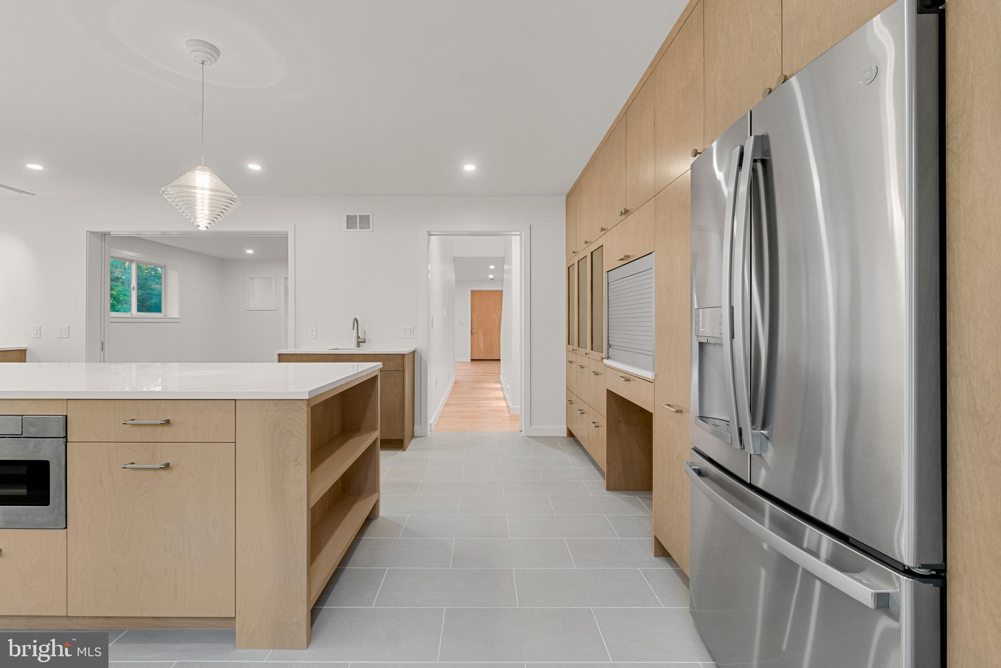 2706 Bartol Avenue Baltimore, MD 21209 - Photo 21 of 62 a kitchen with a refrigerator and a sink