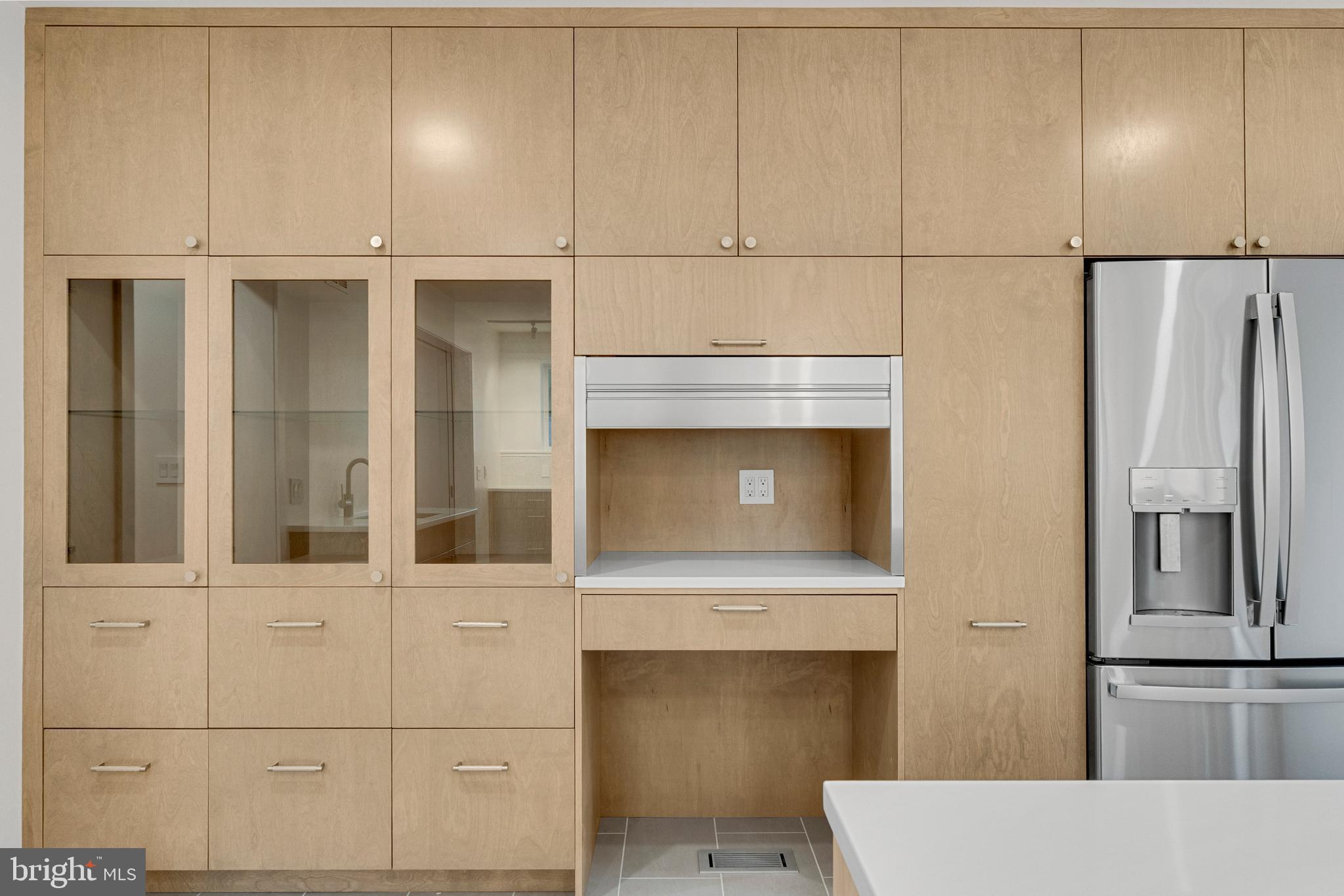 2706 Bartol Avenue Baltimore, MD 21209 - Photo 26 of 62 a kitchen with a refrigerator and cabinets