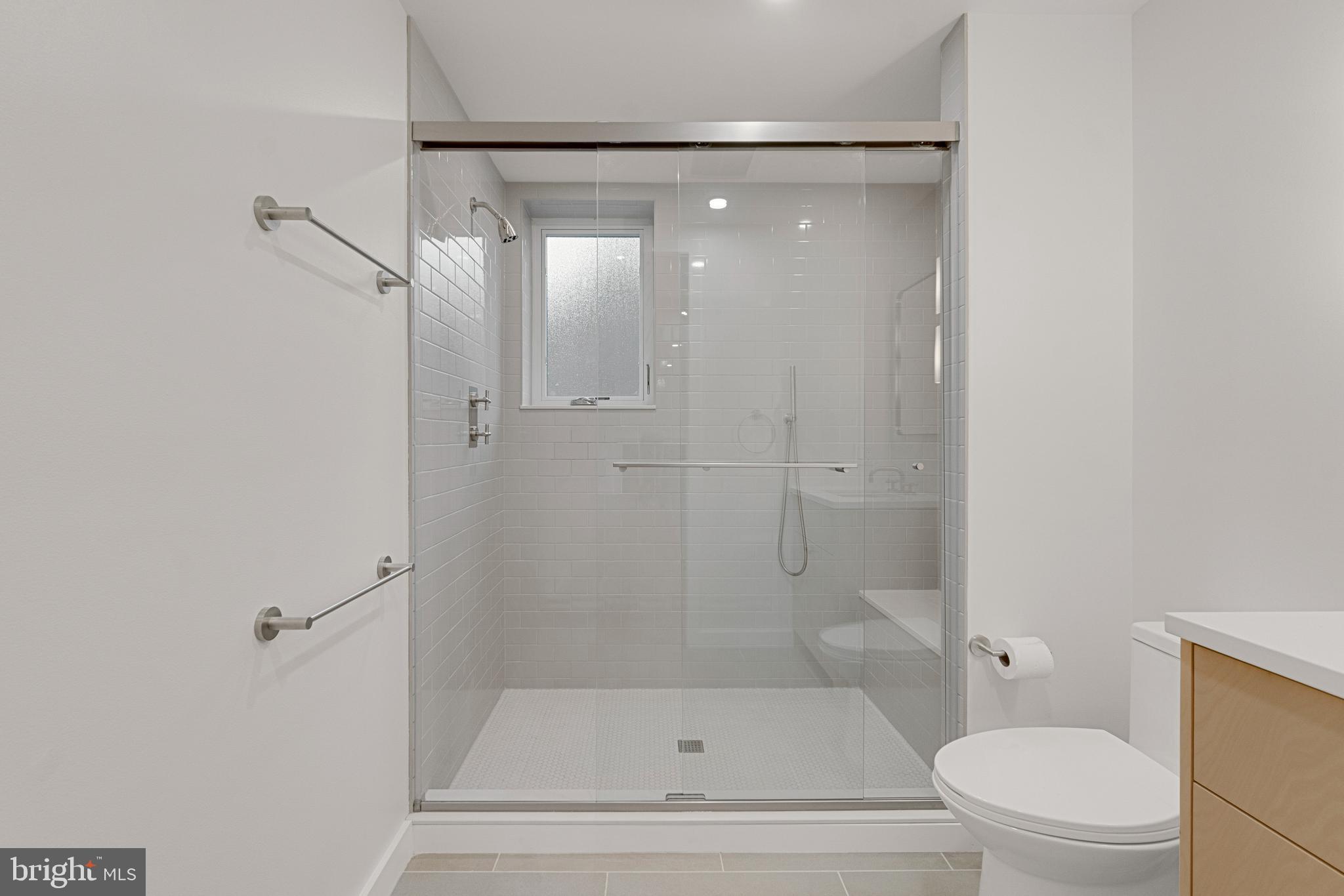 2706 Bartol Avenue Baltimore, MD 21209 - Photo 32 of 62 a bathroom with a bathtub and a shower