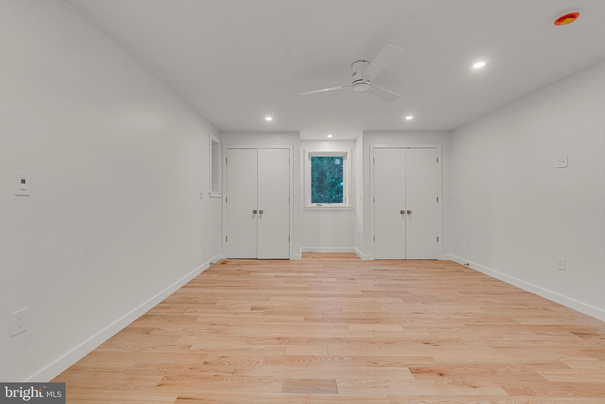 2706 Bartol Avenue Baltimore, MD 21209 - Photo 36 of 62 a view of an empty room with wooden floor