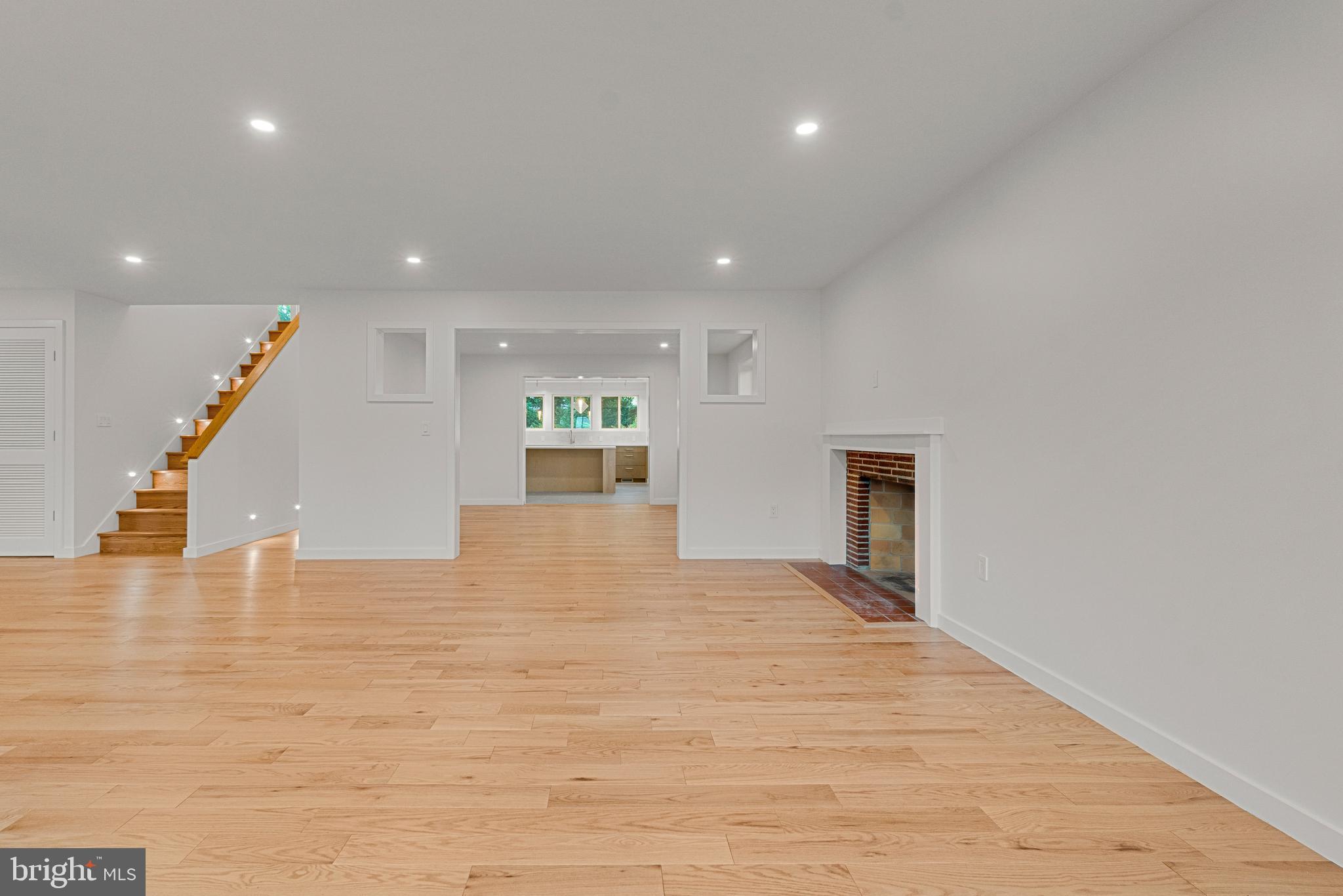 2706 Bartol Avenue Baltimore, MD 21209 - Photo 9 of 62 a view of an empty room with wooden floor