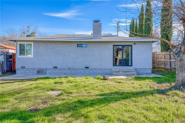 a view of a yard with furniture