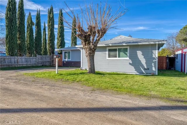 a house view with a backyard space