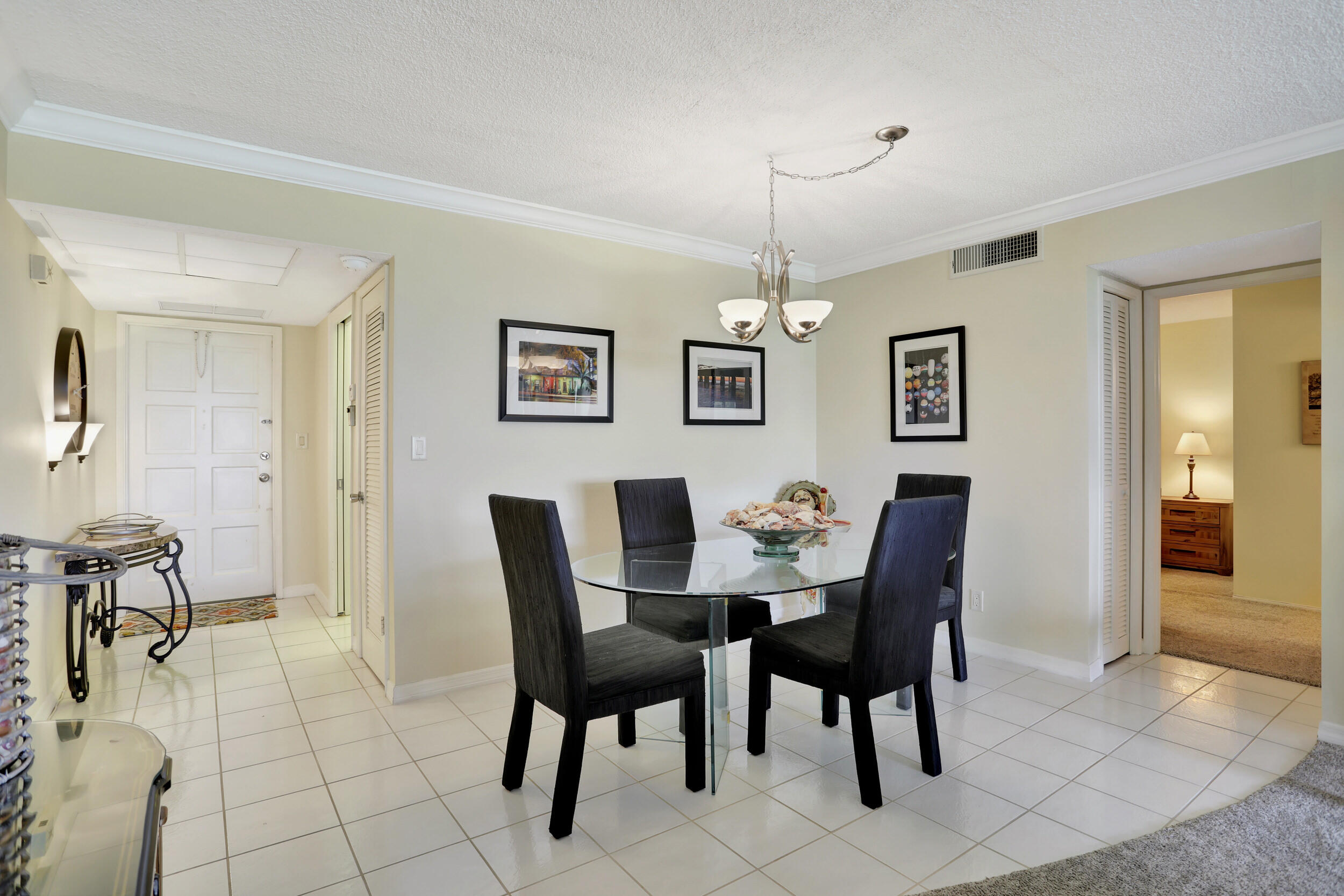 3001 South Course Drive, Unit 508 Pompano Beach, FL 33069 - Photo 11 of 36 a view of a dining room with furniture