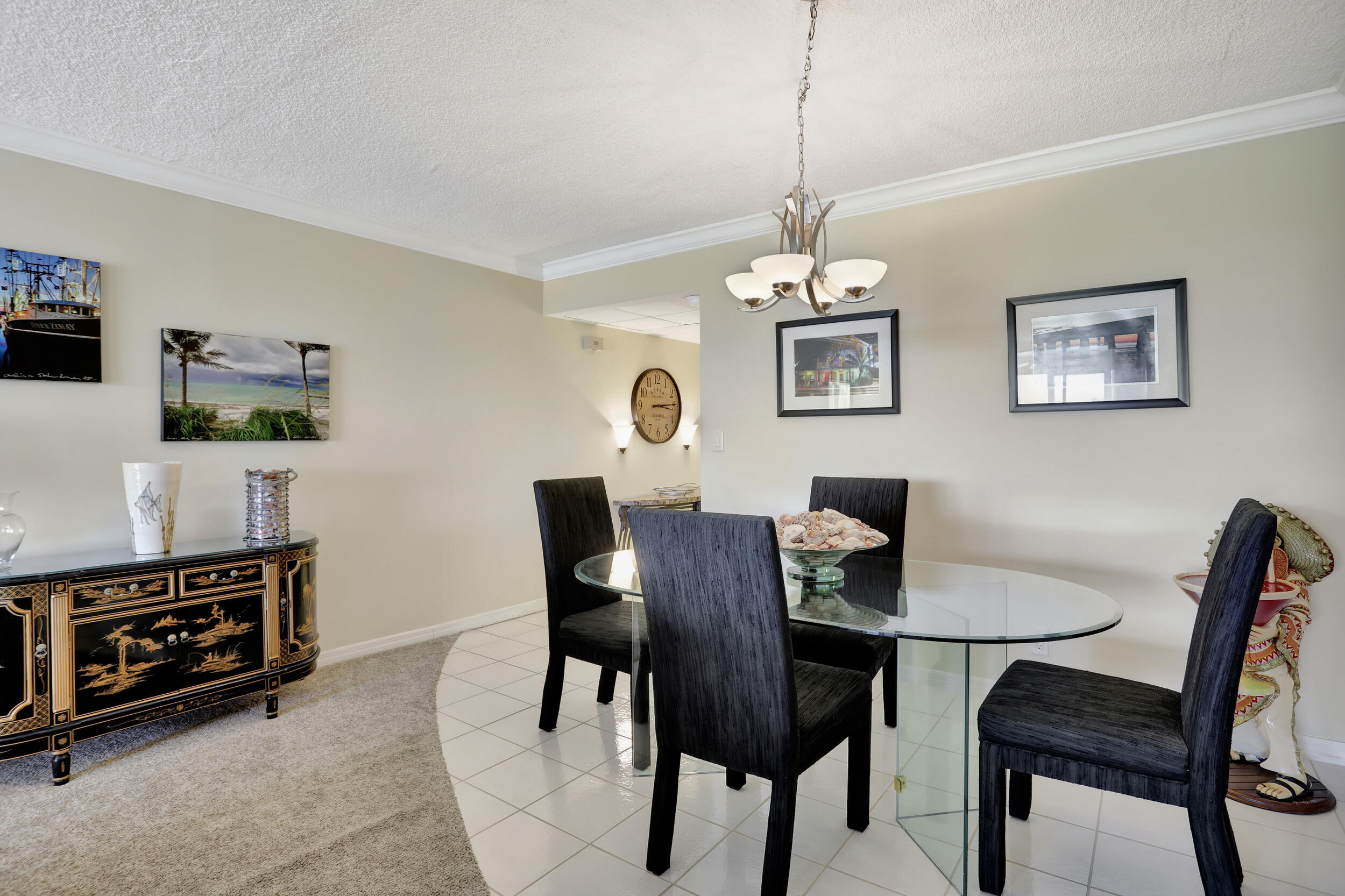 3001 South Course Drive, Unit 508 Pompano Beach, FL 33069 - Photo 12 of 36 a dining room with furniture and window