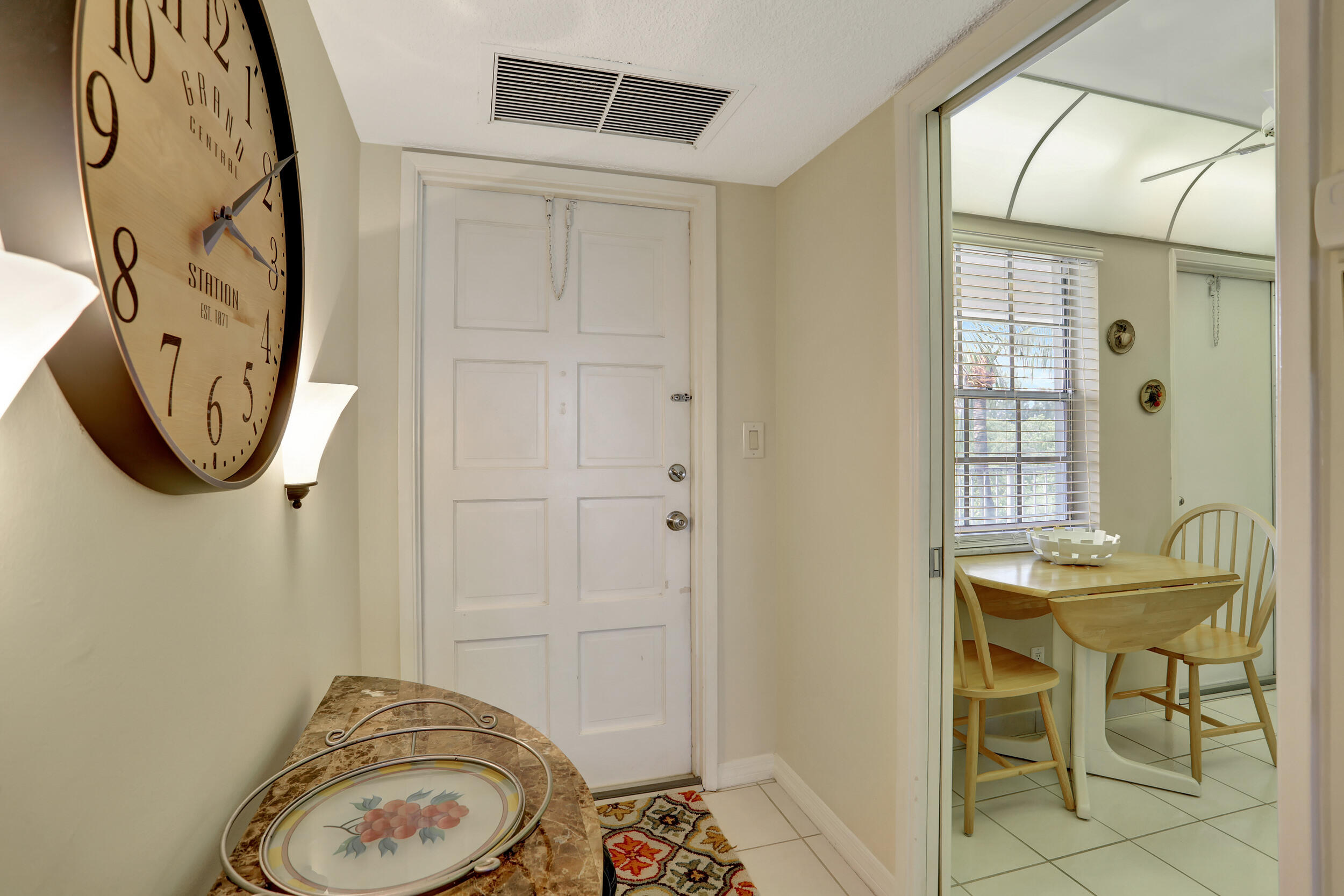 3001 South Course Drive, Unit 508 Pompano Beach, FL 33069 - Photo 2 of 36 a bathroom with a toilet and a sink