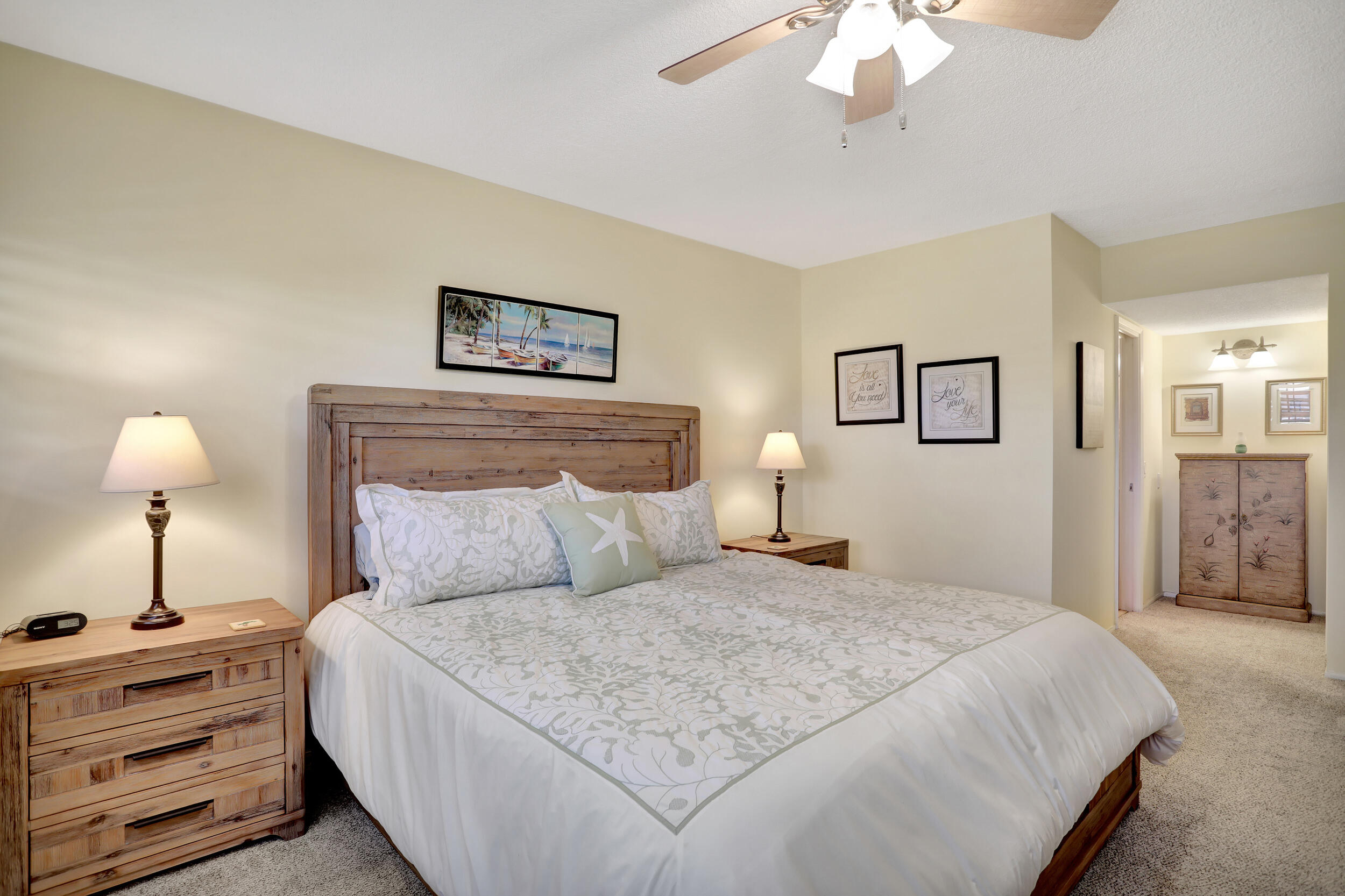 3001 South Course Drive, Unit 508 Pompano Beach, FL 33069 - Photo 21 of 36 a bedroom with a bed and a lamp