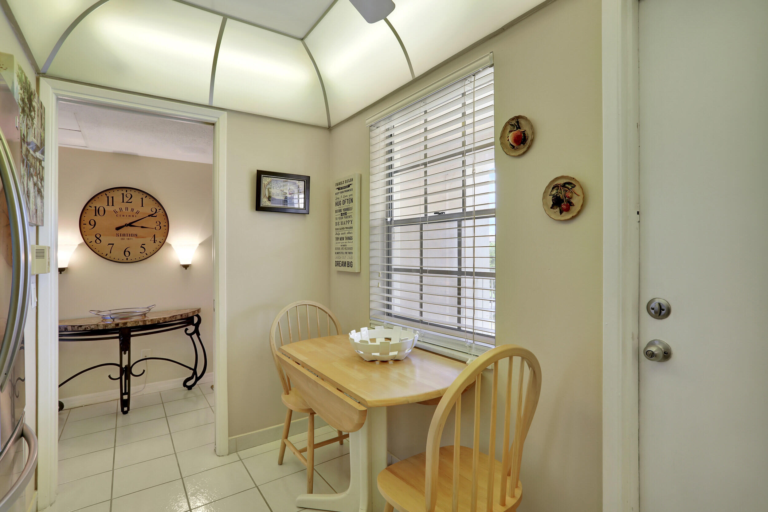 3001 South Course Drive, Unit 508 Pompano Beach, FL 33069 - Photo 3 of 36 a bathroom with a sink and a mirror