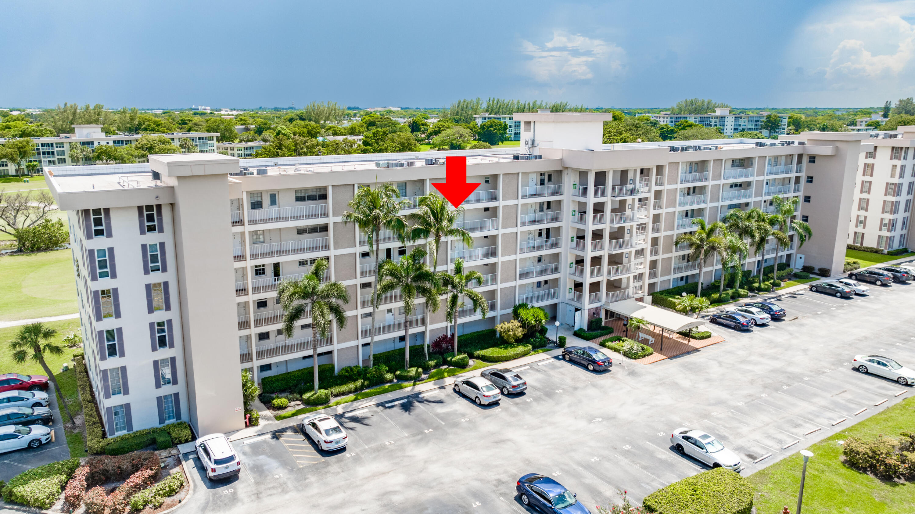 3001 South Course Drive, Unit 508 Pompano Beach, FL 33069 - Photo 32 of 36 a view of a street with plants