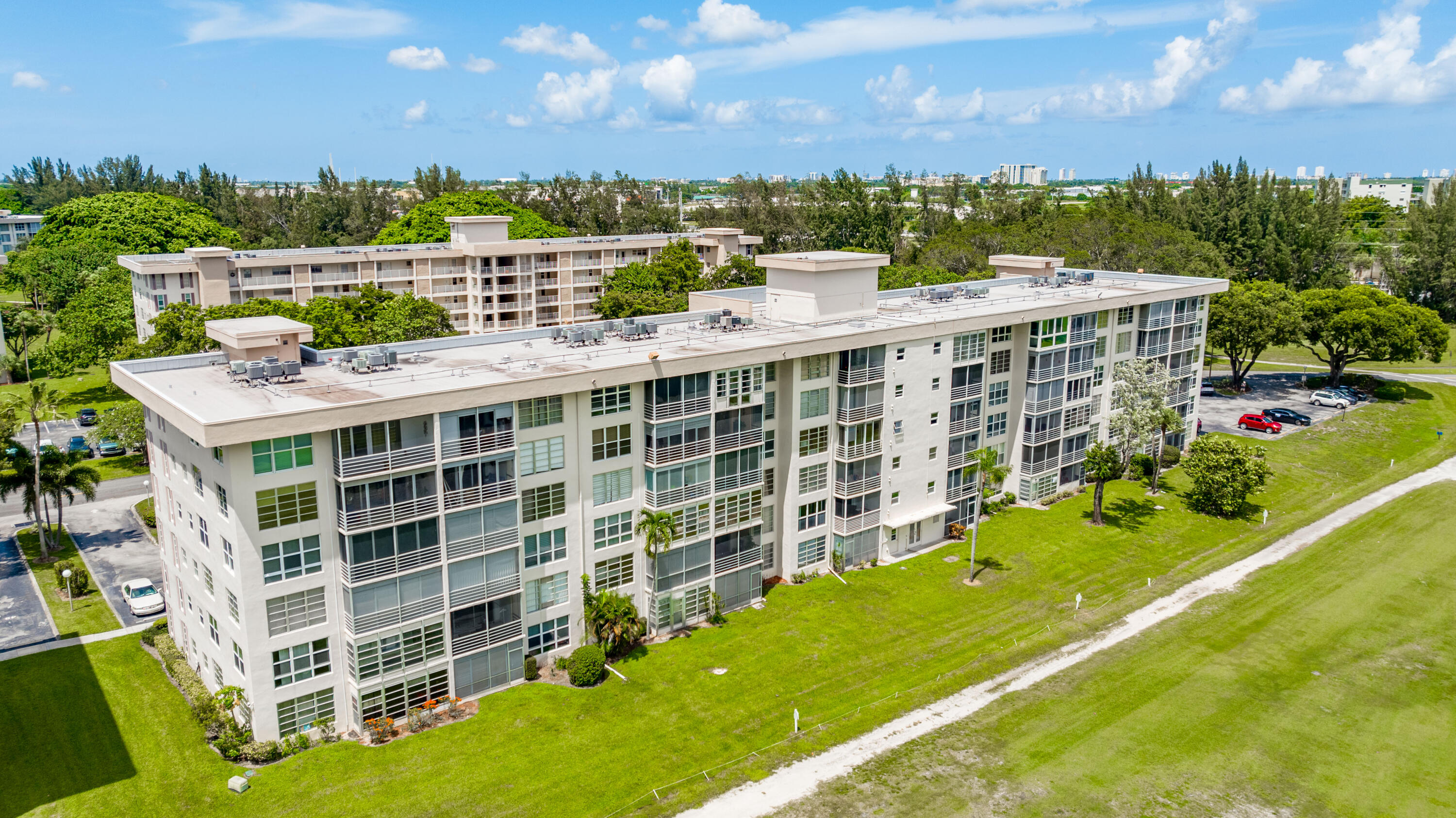 3001 South Course Drive, Unit 508 Pompano Beach, FL 33069 - Photo 33 of 36 a view of a city with tall buildings