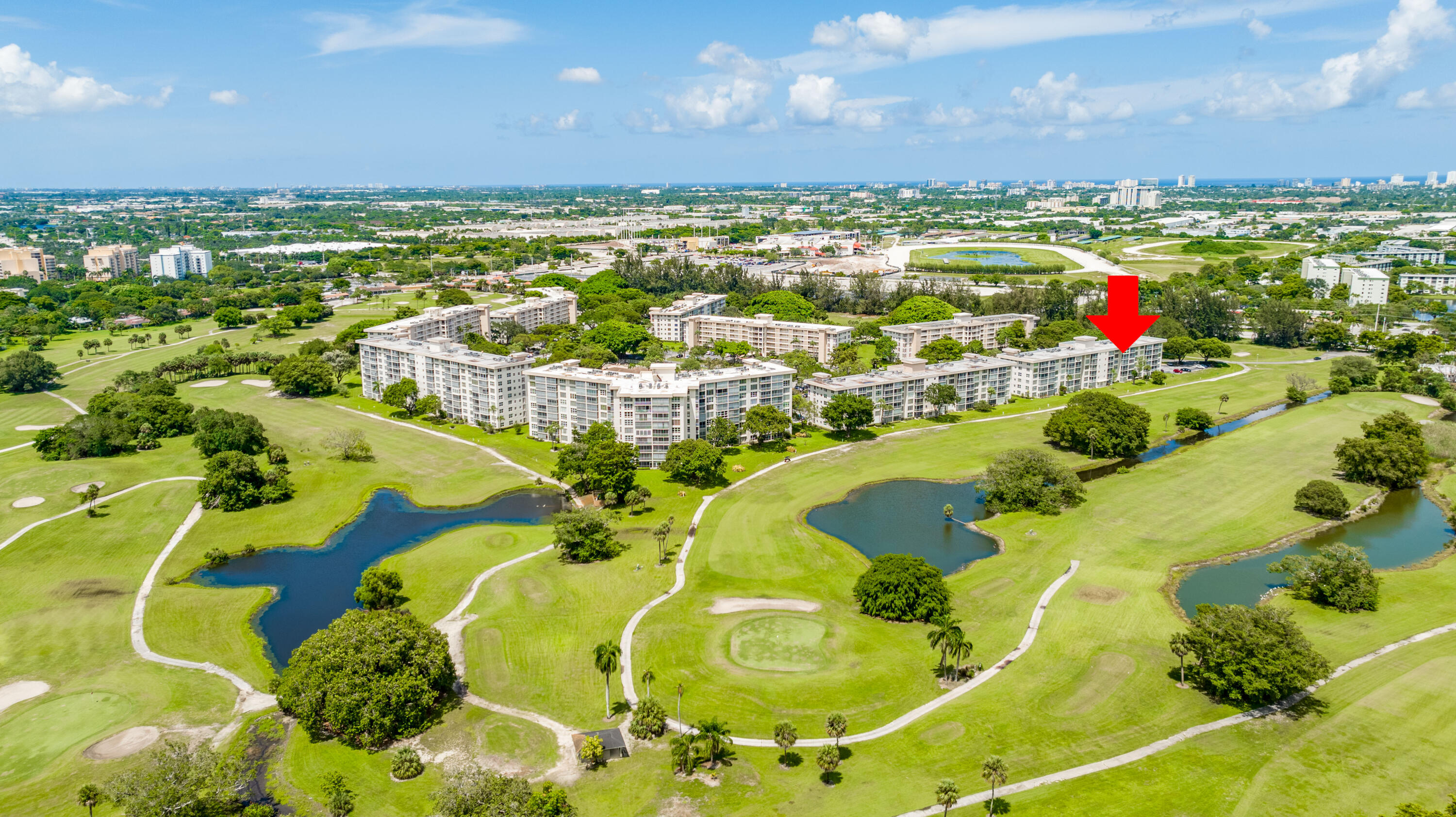3001 South Course Drive, Unit 508 Pompano Beach, FL 33069 - Photo 35 of 36 a view of building