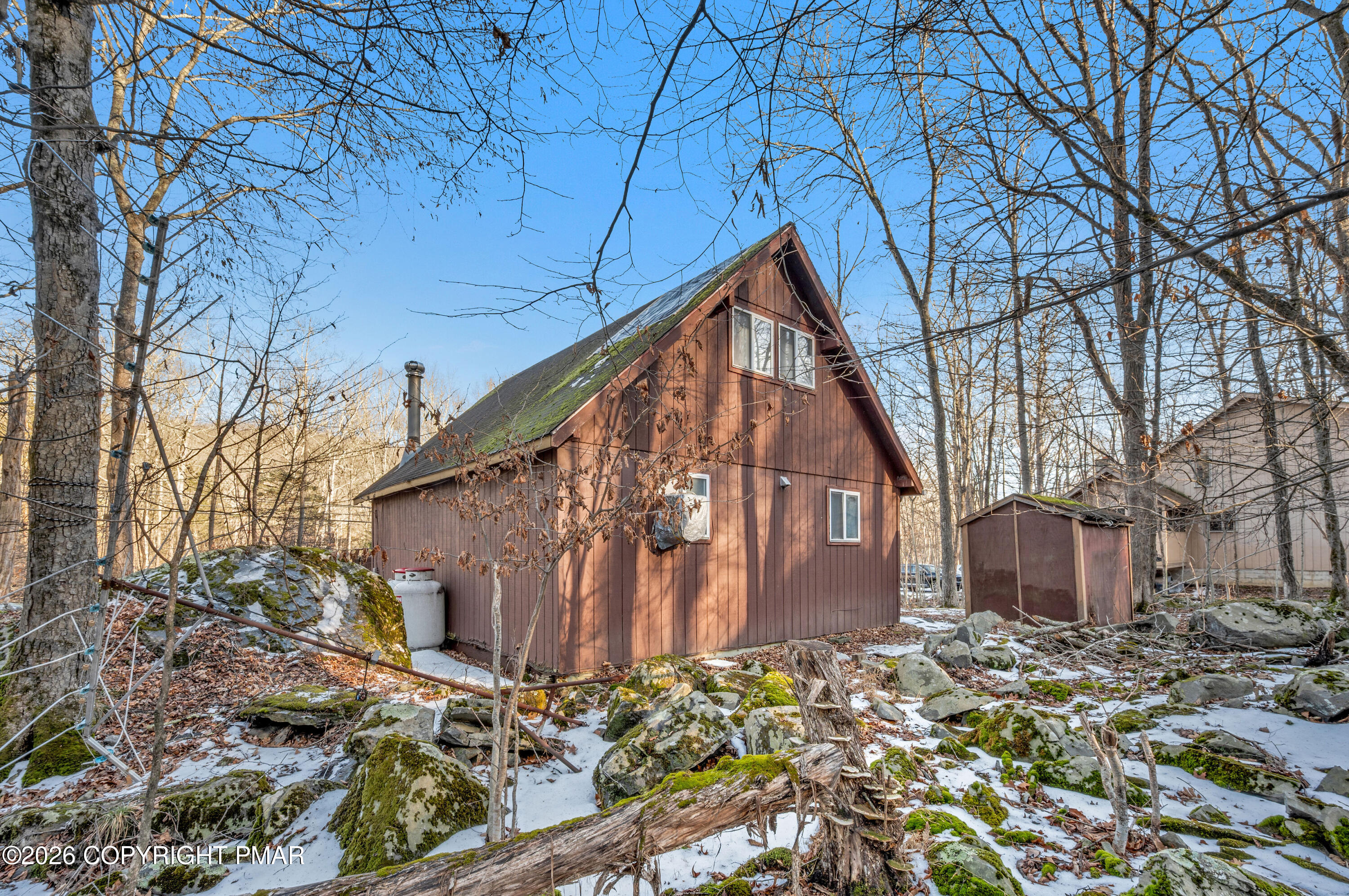 5791 Decker Road Bushkill, PA 18324 - Photo 4 of 17 a backyard of a house with lots of green space