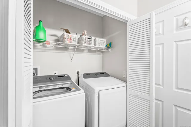 a utility room with dryer and washer