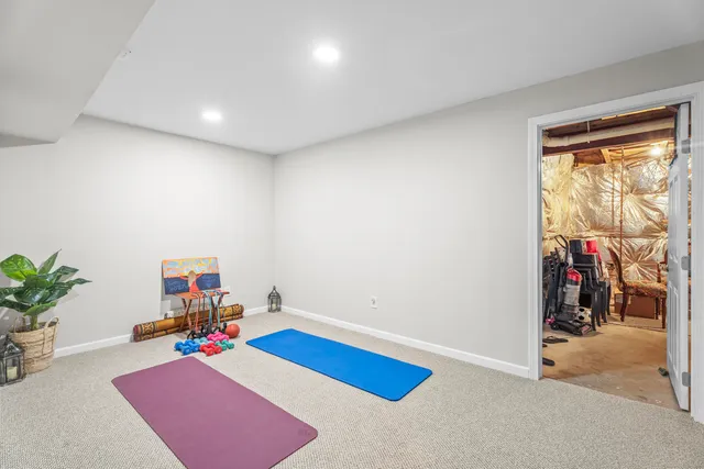 a room with furniture and rug