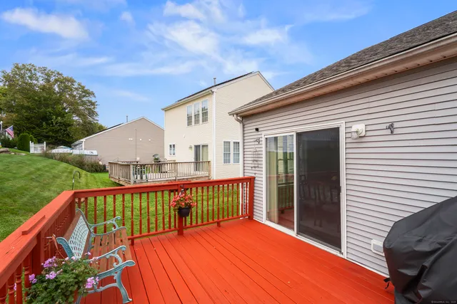 a view of a house with porch and wooden floor