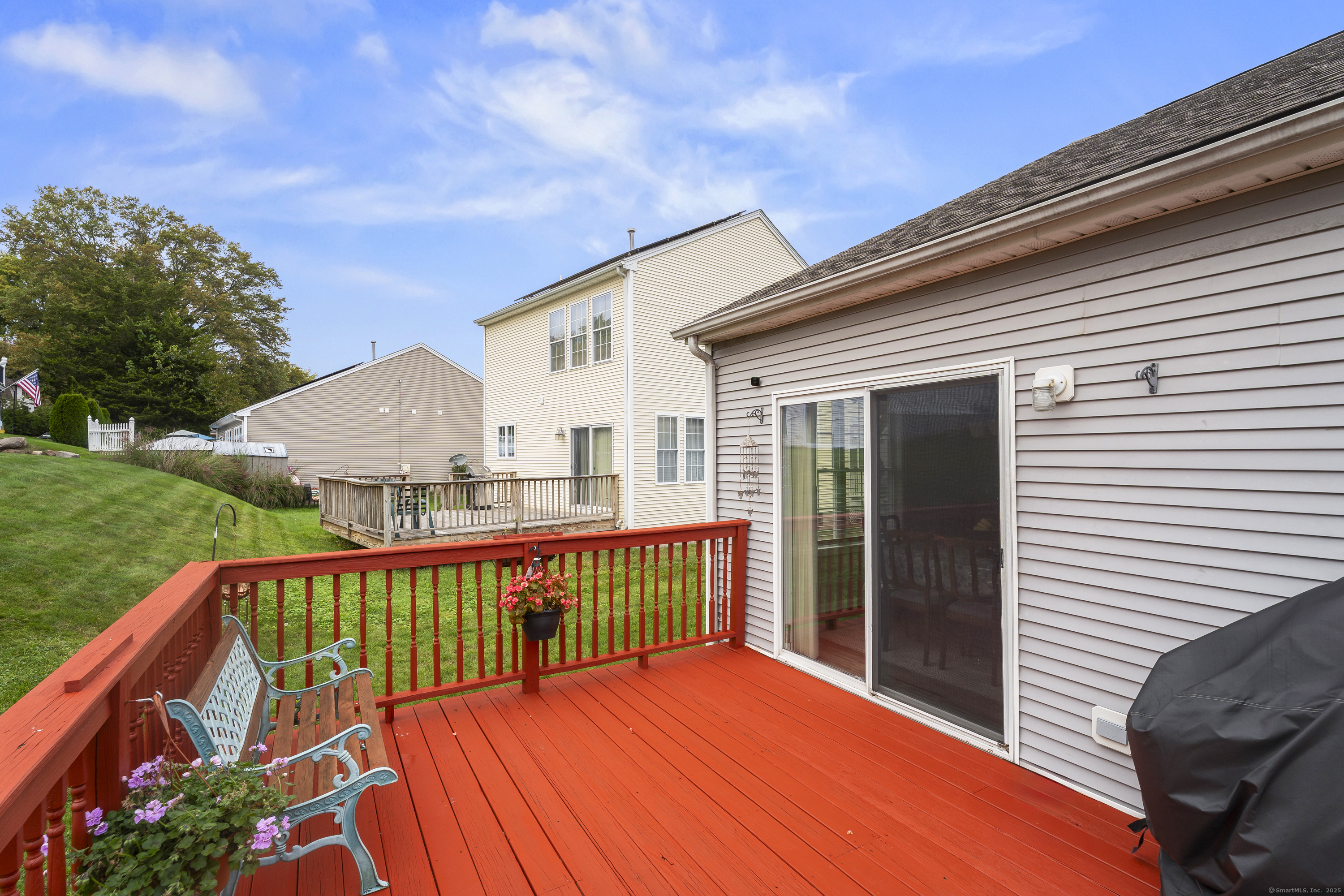 29 Primrose Lane, Unit 29 Suffield, CT 06078 - Photo 28 of 32 a view of a house with porch and wooden floor