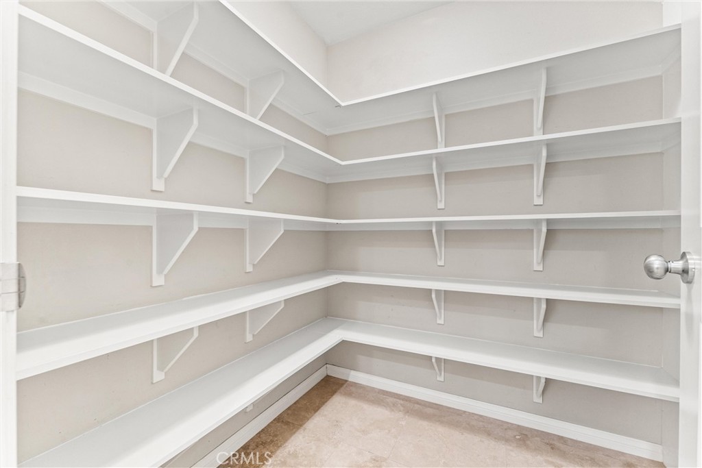 37 Peony Irvine, CA 92618 - Photo 14 of 56 a view of walk in closet with empty racks