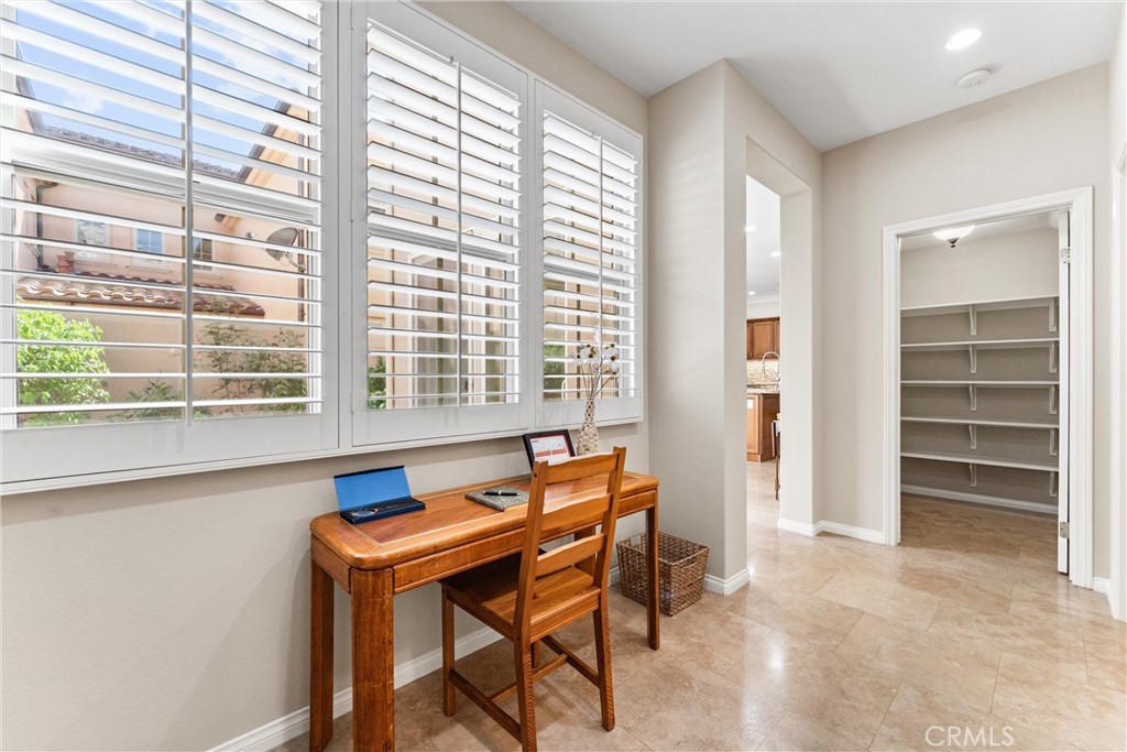 37 Peony Irvine, CA 92618 - Photo 16 of 56 a blue chair sitting in front of a window