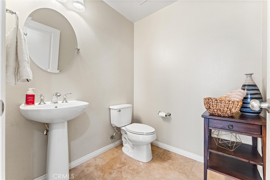 37 Peony Irvine, CA 92618 - Photo 17 of 56 a bathroom with a sink toilet and a mirror