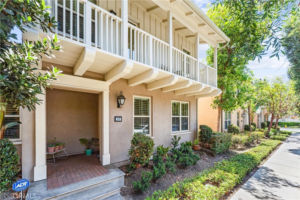 37 Peony Irvine, CA 92618 - Photo 3 of 56 a view of a patio with couches table and chairs and potted plants