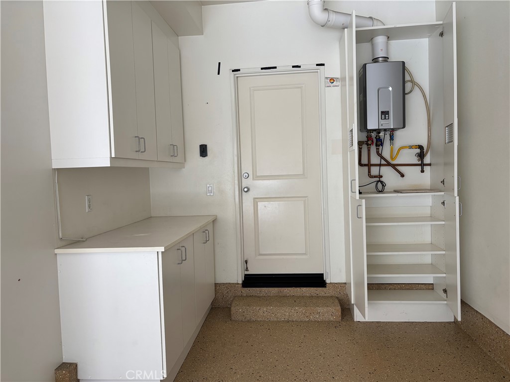 37 Peony Irvine, CA 92618 - Photo 40 of 56 a utility room with cabinets