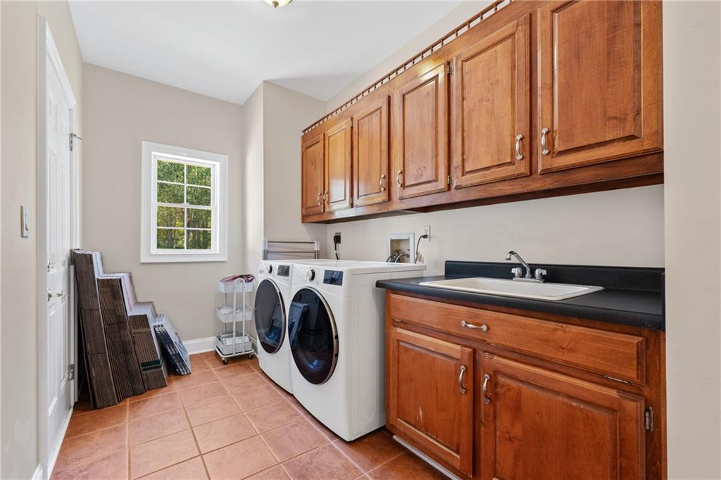 422 Blessings Lane Nicholson, GA 30565 - Photo 31 of 90 a utility room with sink dryer and washer
