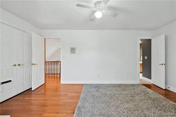 a view of a swimming pool with a yard