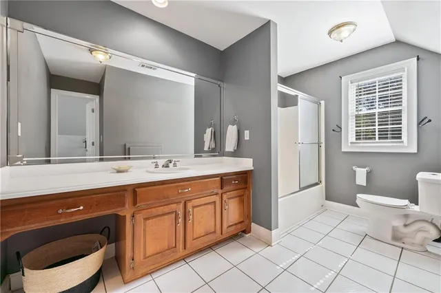 a view of a table and chairs in the garden