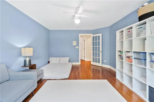 an aerial view of a house with a yard and sitting area