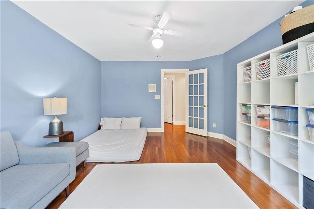 422 Blessings Lane Nicholson, GA 30565 - Photo 48 of 90 a living room with furniture and a book shelf
