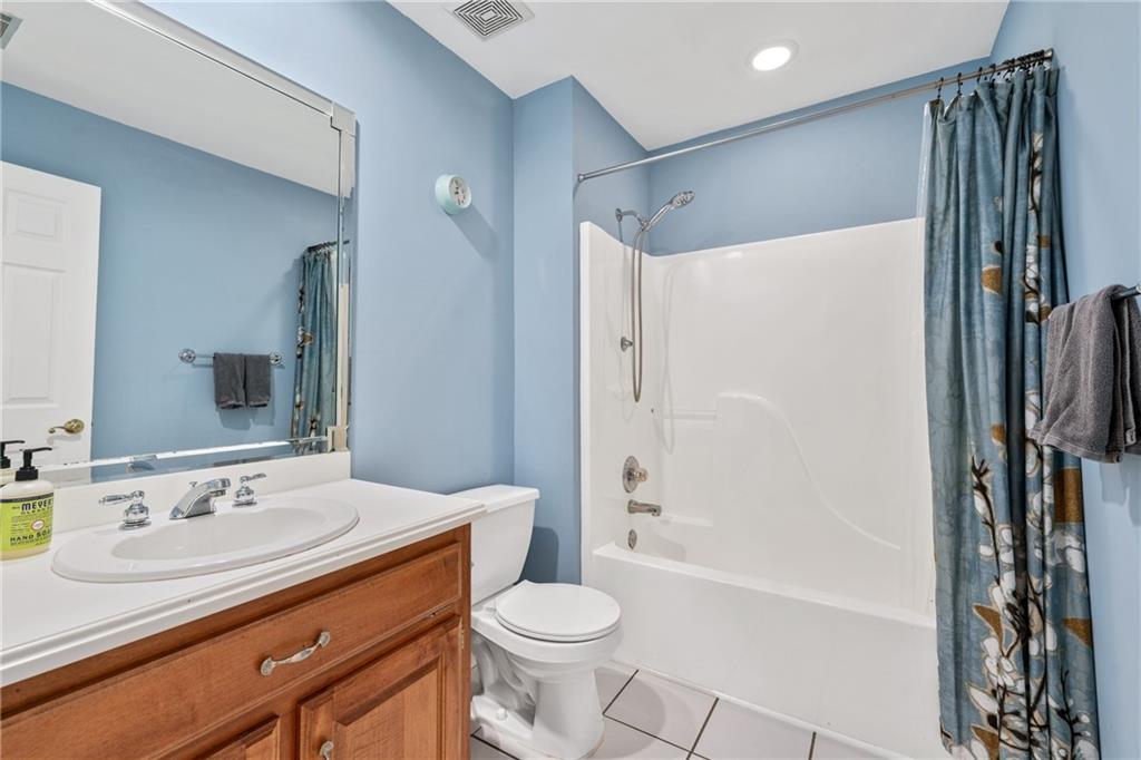 422 Blessings Lane Nicholson, GA 30565 - Photo 49 of 90 a bathroom with a sink toilet and shower