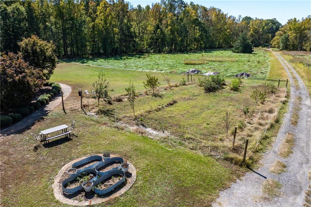422 Blessings Lane Nicholson, GA 30565 - Photo 74 of 90 a view of a swimming pool with a yard