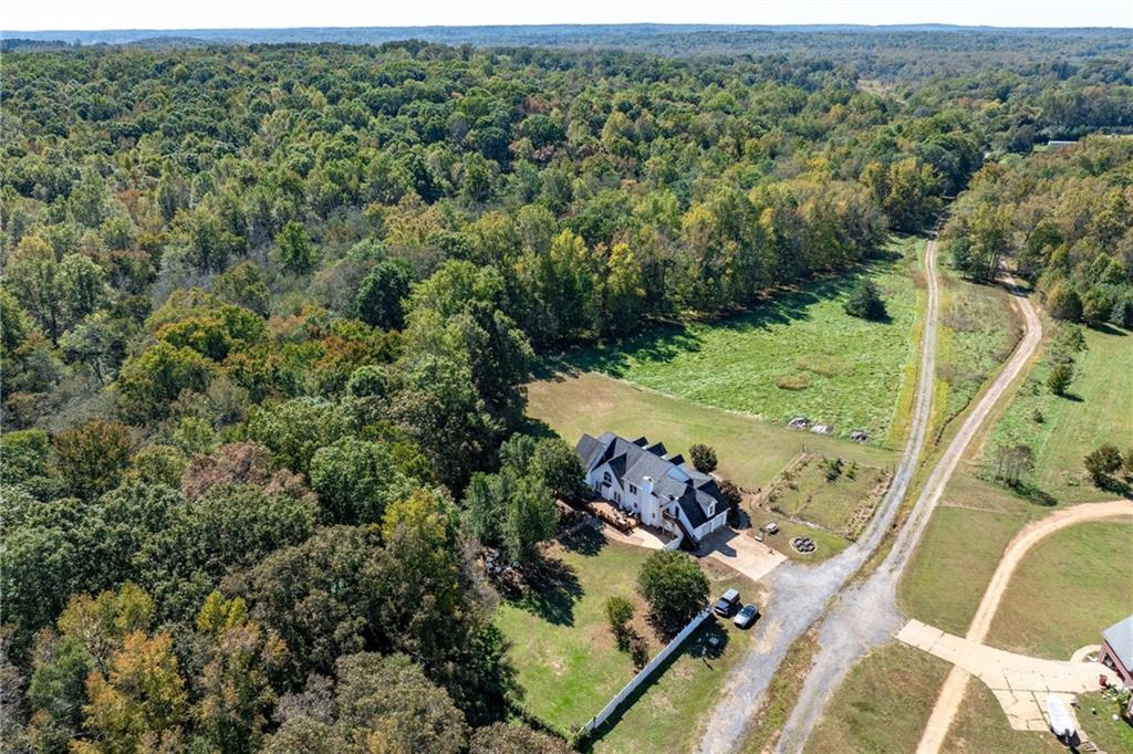 422 Blessings Lane Nicholson, GA 30565 - Photo 85 of 90 an aerial view of a house with a yard