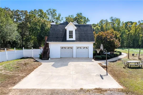 a kitchen with stainless steel appliances a stove sink and cabinets