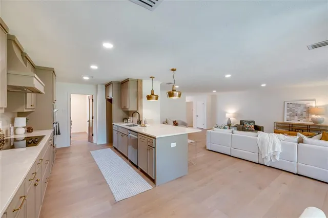 a dining room with furniture and a window