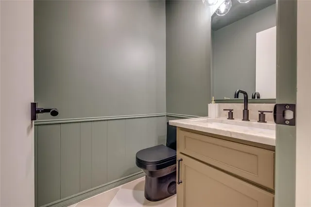 a view of an empty room with empty shelves