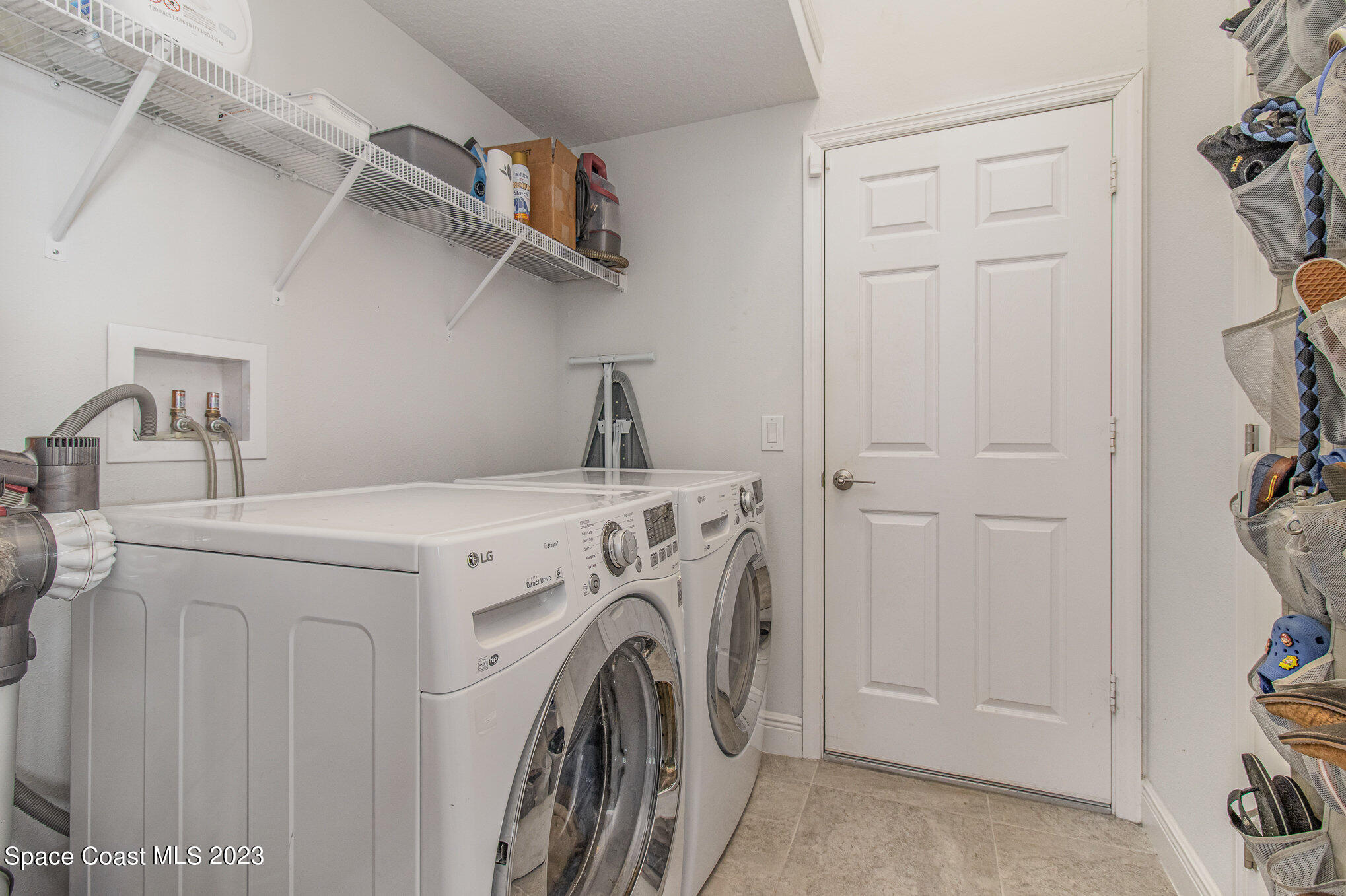 4362 Ruthann Circle Melbourne, FL 32934 - Photo 18 of 25 INSIDE LAUDRY ROOM WASHER/DRYER CONVEY