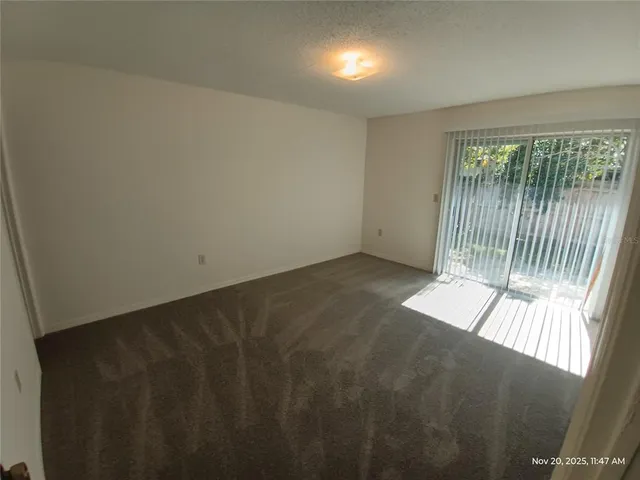 en empty room with windows