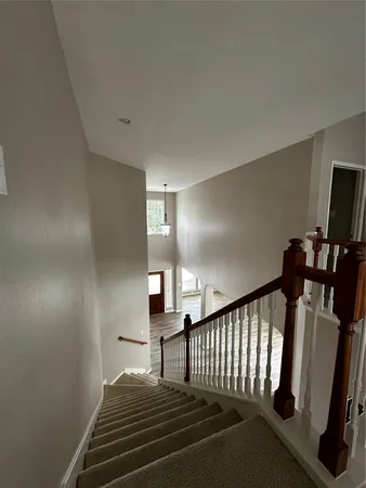 a view of entryway with stairs