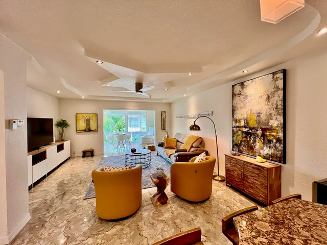 a living room with furniture and a couch