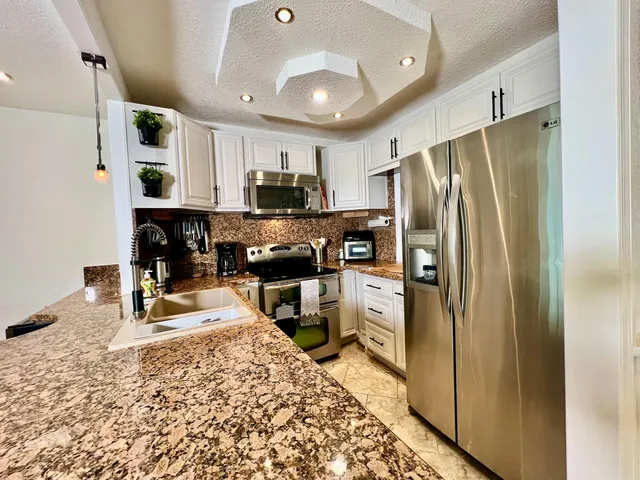 a bedroom with a bed and a walk in closet