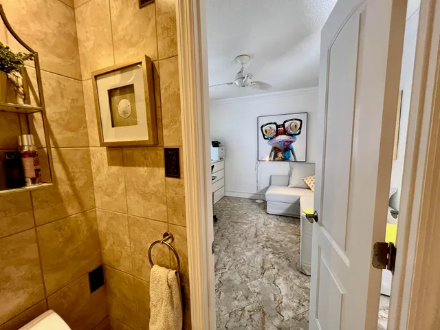 a view of yard with swimming pool and green space