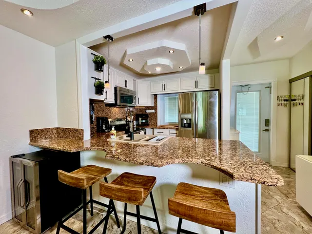 a view of a house with a big yard