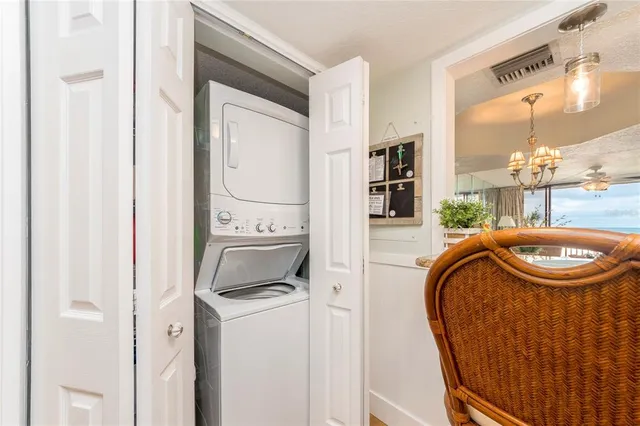 a bathroom with a sink mirror vanity and toilet