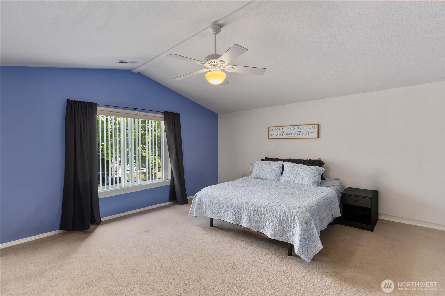 8305 Sweetbrier Loop Southeast Olympia, WA 98513 - Photo 27 of 40 a bedroom with a bed and a lamp with window