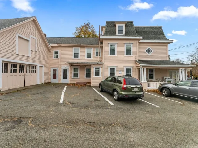a car parked in front of a house
